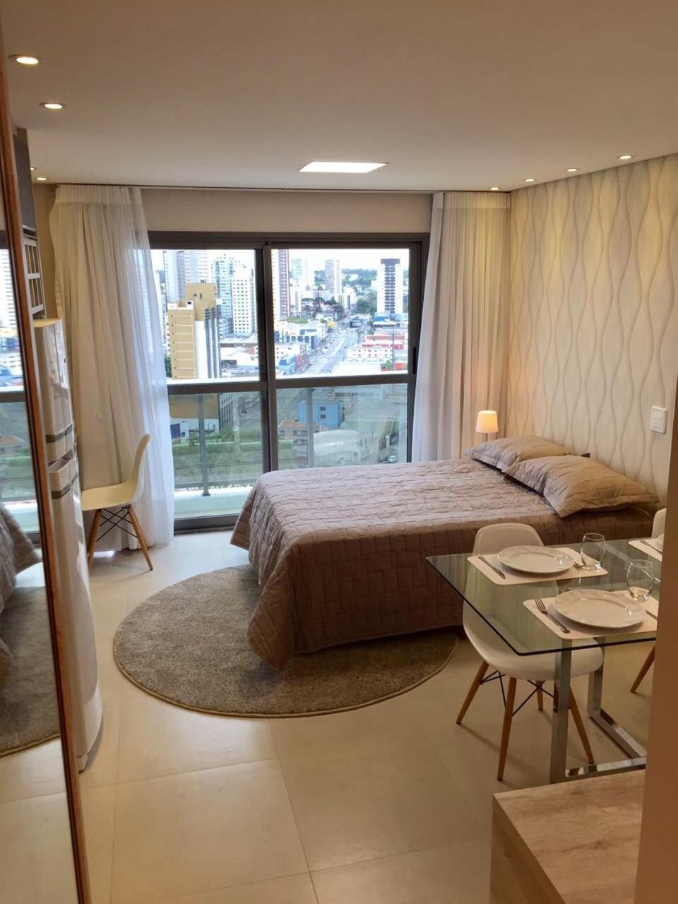 Estudio moderno com linda vista para a Serra Curitiba Bagian luar foto