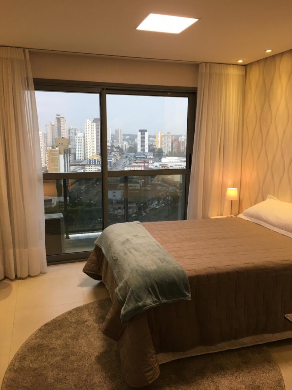 Estudio moderno com linda vista para a Serra Curitiba Bagian luar foto